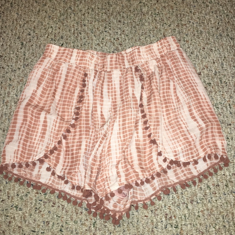 Flowy shorts with pom-pom detailing
